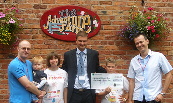 Dave and Rik handing over £500 to the Childrens Adventure Farm