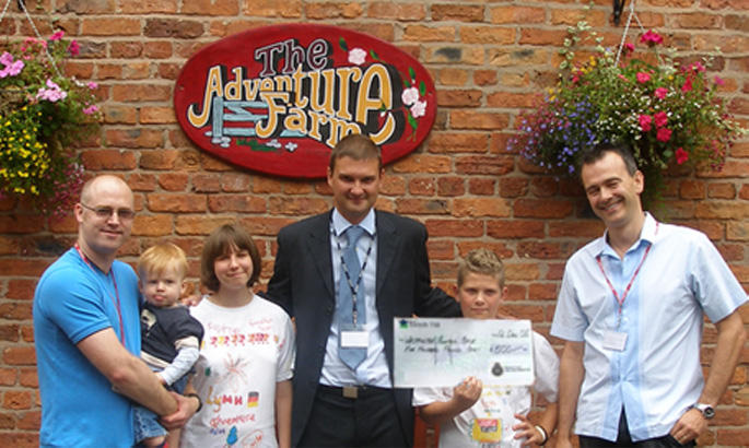 adventurefarm.jpg Dave and Rik handing over £500 to the Childrens Adventure Farm